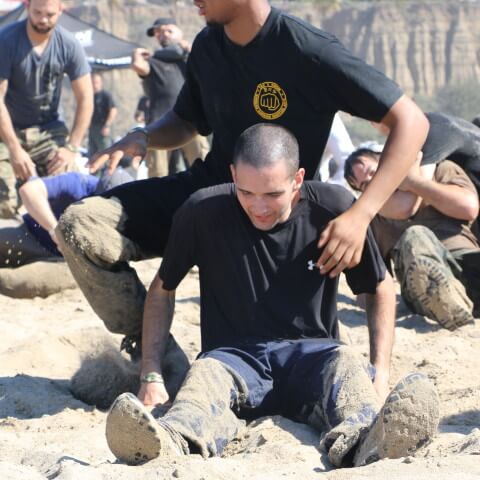 Tactical fitness and fighting training at the beach