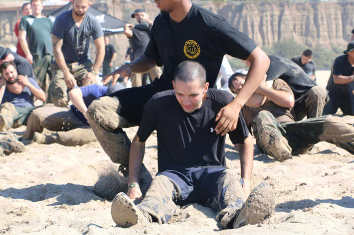 Tactical fitness and fighting training at the beach