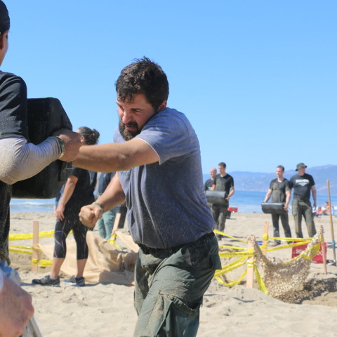 Krav maga punching training at the beach