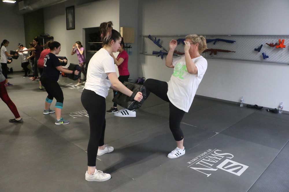 Women's self defense training kicks