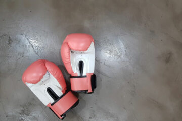 pink-boxing-gloves-concrete