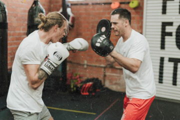 two-men-sparring-boxing-gym